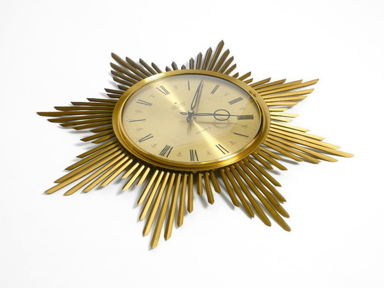 Image 1 of Wunderschöne große originale Sunburst-Wanduhr aus Messing aus den 1960er Jahren von Junghans ATO-MAT