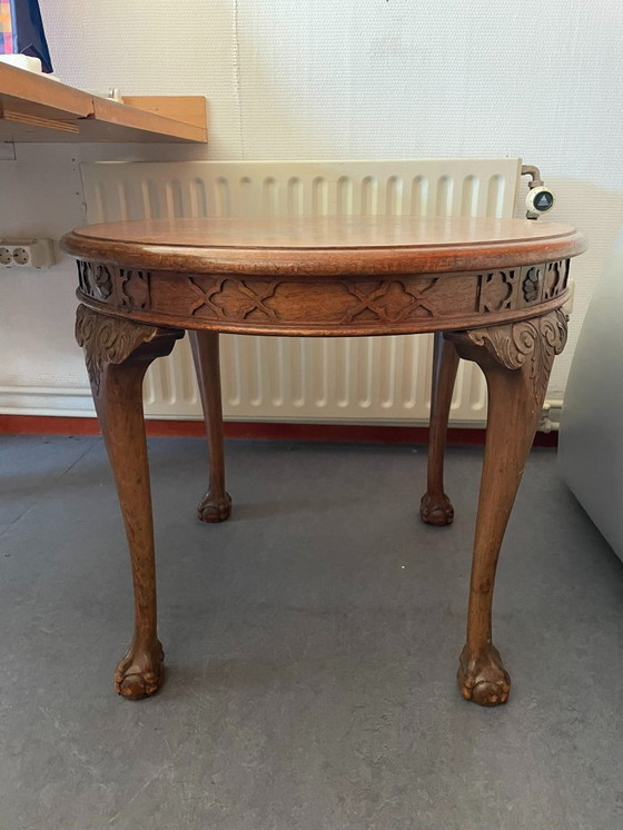 Image 1 of Antique round side table with claw feet