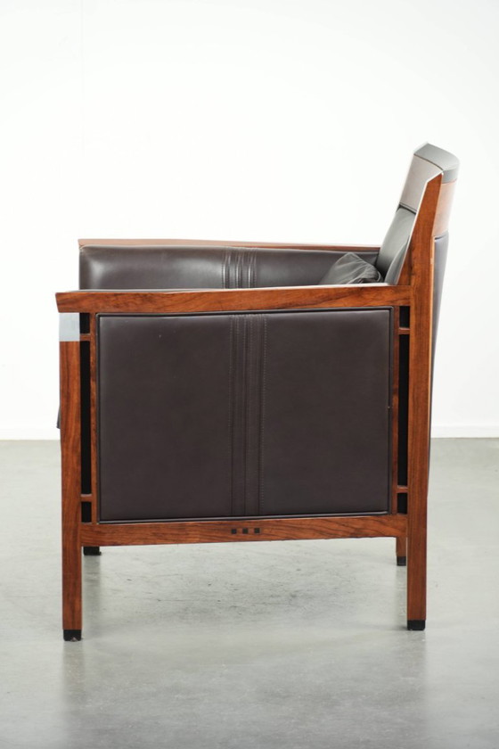 Image 1 of Luxe Schuitema Art Deco design set bestaande uit een fauteuil en hocker uit de Decoforma serie in chocolade bruin rundleer