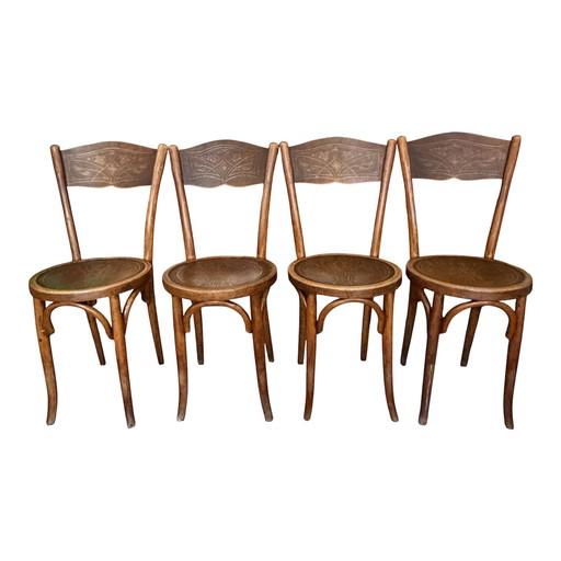 Set of 4 W. Baumann & Cie chairs