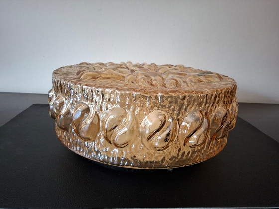 Image 1 of 2 amber-colored glass ceiling lamps from the 60s/70s