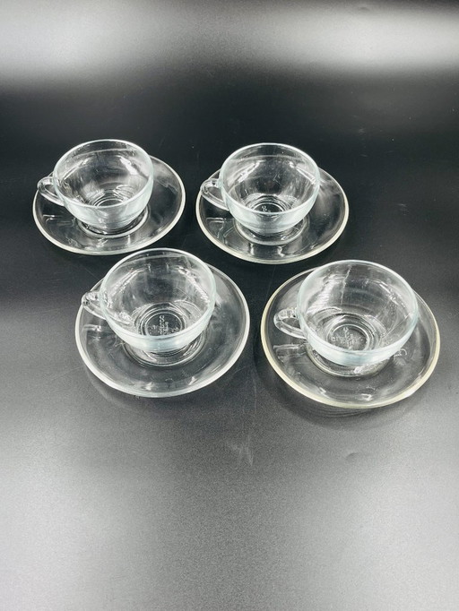 Set of 4 Arcopal glass cups and saucers
