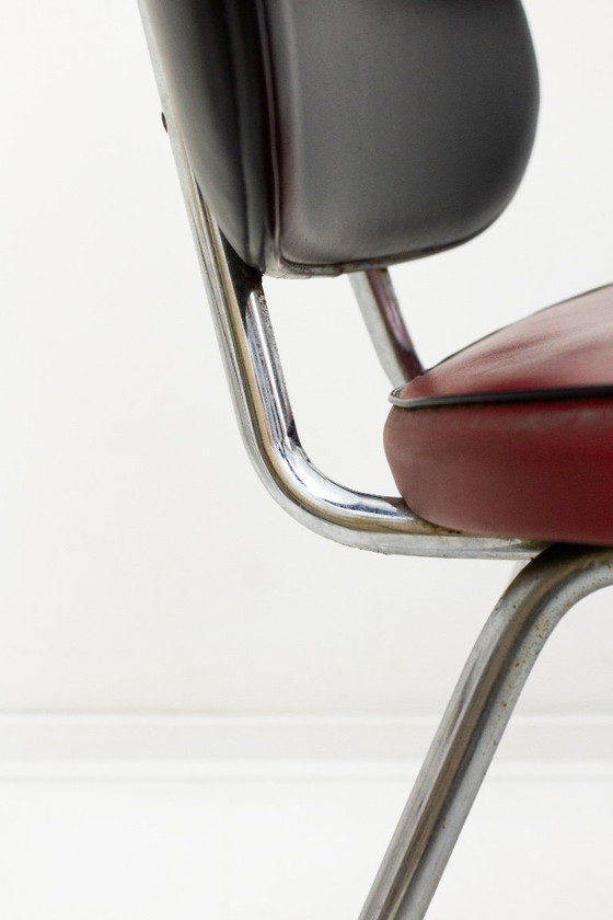 Image 1 of Vintage metalen stoel met zwart rode skai leren bekleding 