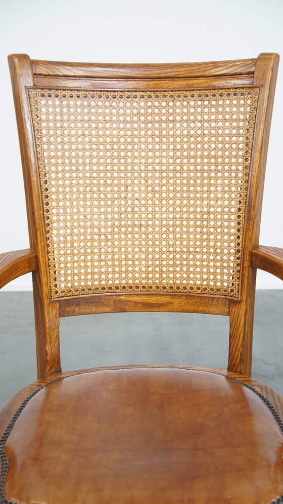 Image 1 of Cognac Colored Leather Office Chair on Wheels with Wood and a Wicker Matted Backrest