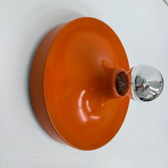 Image 1 of Mid-century design honsel oranje space age schijflamp , jaren 1970 toegeschreven aan Charlotte Perriand voor les arcs