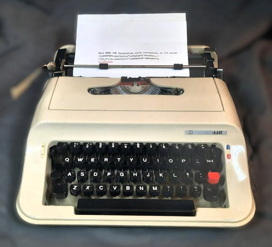 Image 1 of (W003) Machine à écrire portable HEMA 44K vintage – Comme neuve avec ruban encreur neuf !