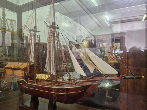 Model ship in display case