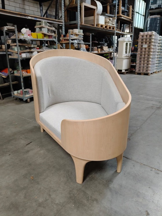 Design Loveseat with Rounded Wooden Shell and Light Upholstery – Textile (photo 2 of 5)