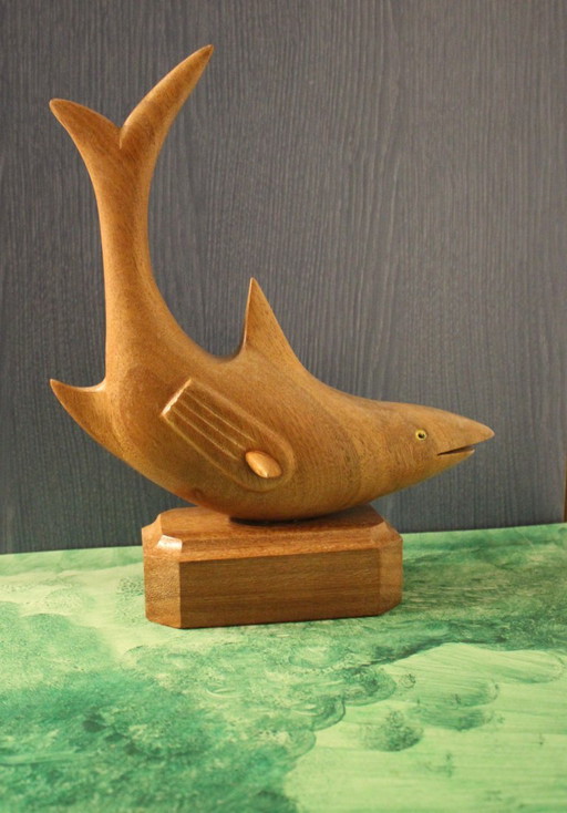 Decorative hand-carved vintage wooden shark figure on a base, circa 1960s