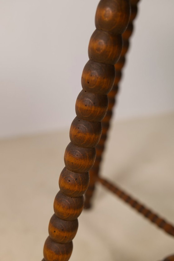 Image 1 of Vintage ronde bijzettafel met spoelmotief