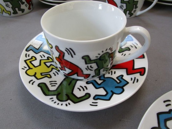 Image 1 of Keith Haring Dinnerware: 3 different sized plates, 1 coffee cup and saucer.