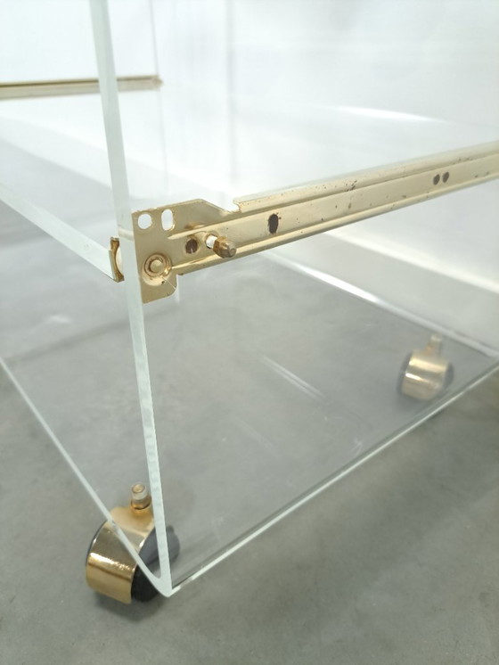 Image 1 of Space age plexiglas trolley met messing