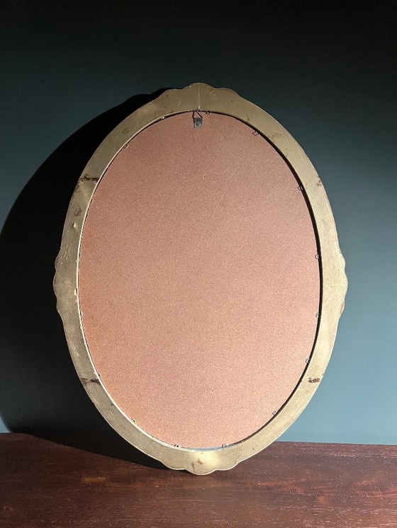 Image 1 of Specchio ovale Art Nouveau / Art Déco con vetro smussato. Originale d'epoca con cornice dorata e decorazione a rose.