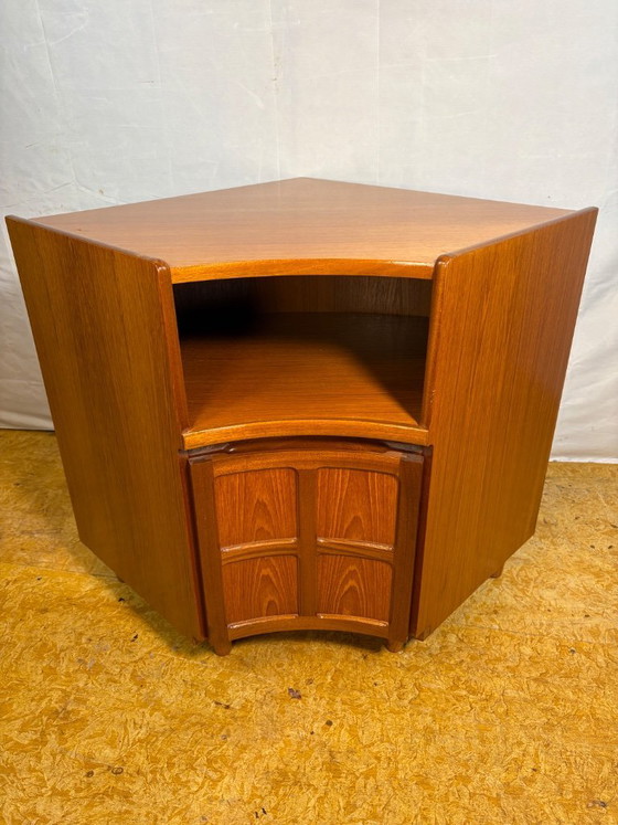 Image 1 of Vintage Nathan Teak Corner Cabinet (c. 1960s–1970s) – Mid-Century Modern  A beautiful and highly practical vintage teak corner c