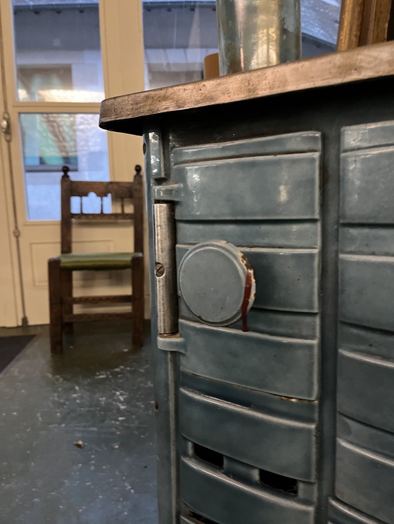 Image 1 of Piccola stufa a legna in ghisa smaltata