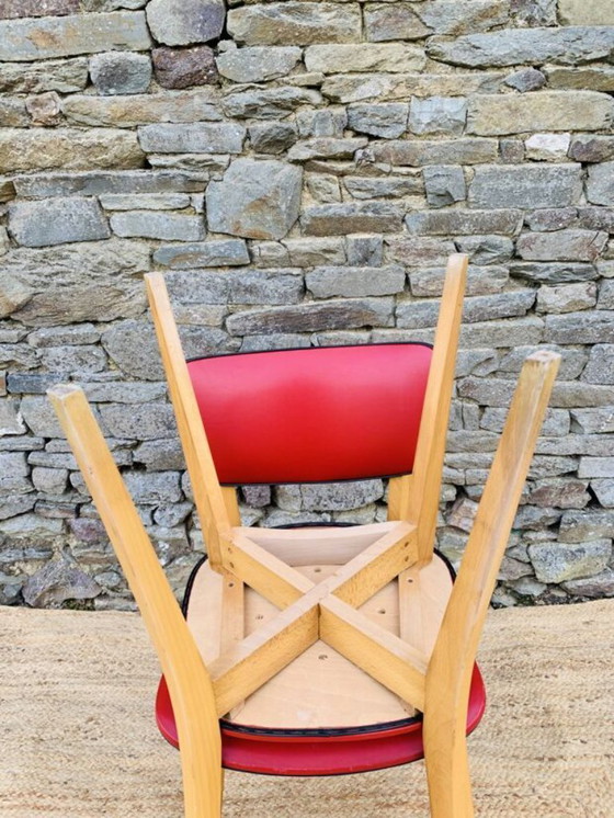Image 1 of Ein Paar rote Stühle