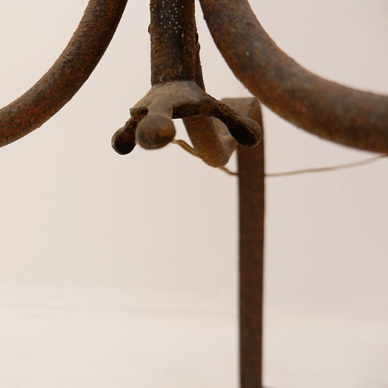 Image 1 of Wrought-iron tripod floor lamp adorned with stylized animal heads