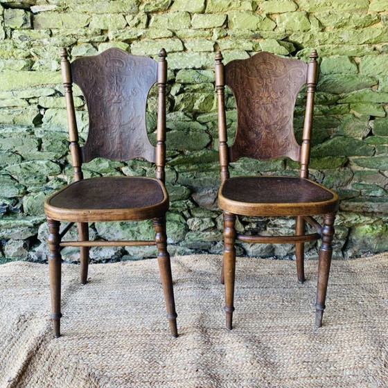 Image 1 of Pair of 2 chairs with relief pattern