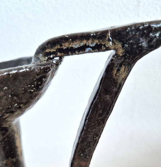 Terracotta ceramic vase with dark metallic drip glaze (photo 5 of 6)