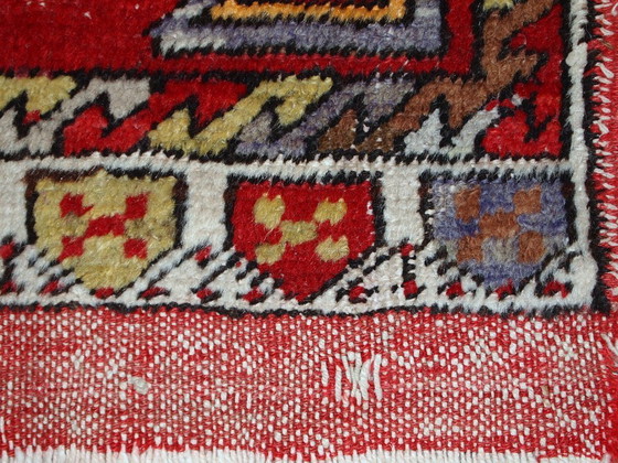 Image 1 of Handmade vintage Turkish Yastik rug 1.6' x 3.5' (48cm x 107cm) 1950s - 1C496