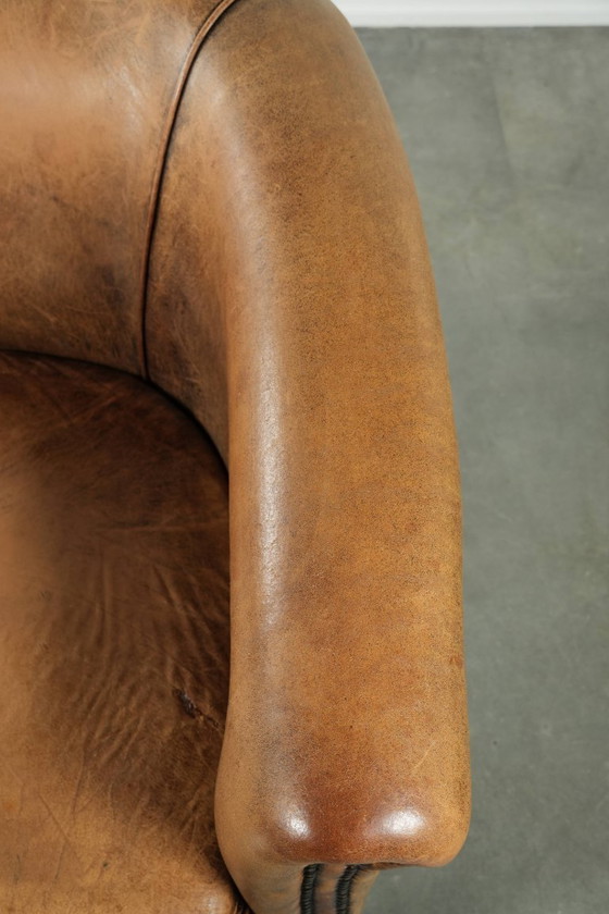 Image 1 of Karaktervolle schapenleren 2 zits bank met een mooie vintage look