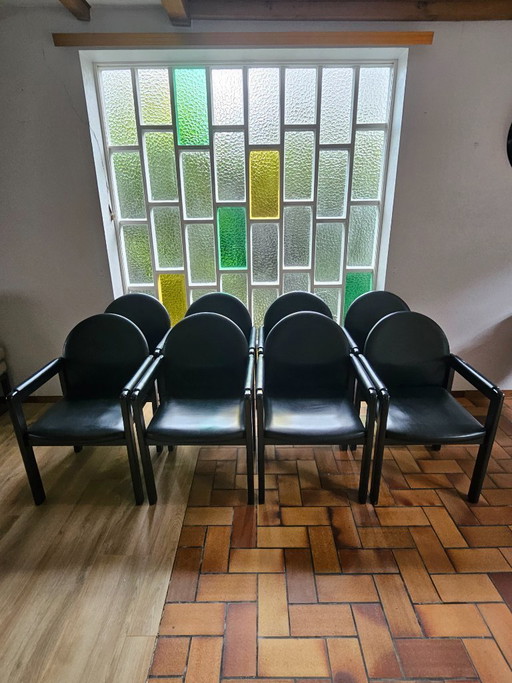 Ensemble de 6 (+2) chaises design Bulo – Cuir noir et bois – Années 1980