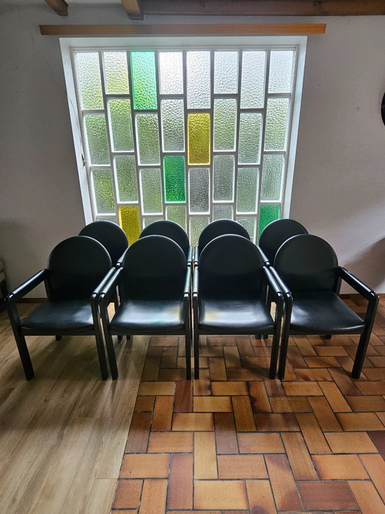 Image 1 of Ensemble de 6 (+2) chaises design Bulo – Cuir noir et bois – Années 1980