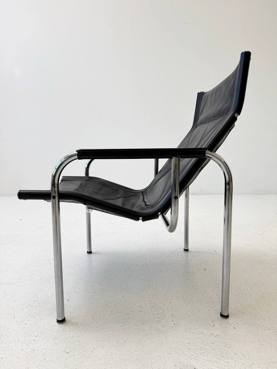 Image 1 of Mid Century 1127 Fauteuil En Cuir Noir De Strässle, 1960Er Avec Ottoman