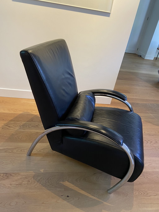 Molinari black leather armchair with roll cushion