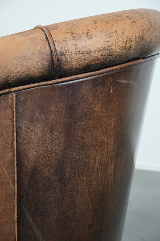 Image 1 of Timeless vintage sheepskin club armchair with character and a beautiful patina