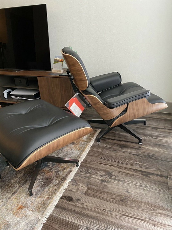 Image 1 of Poltrona e poggiapiedi Herman Miller Eames, 100% autentici.