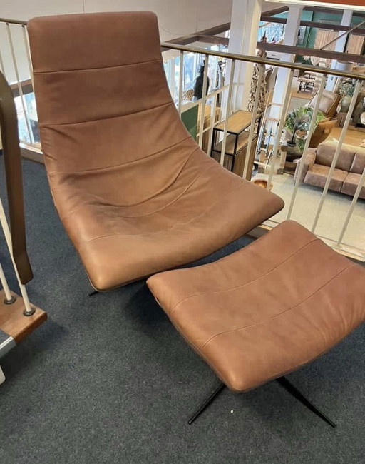 Sillón + otomana Turner Bodilson
