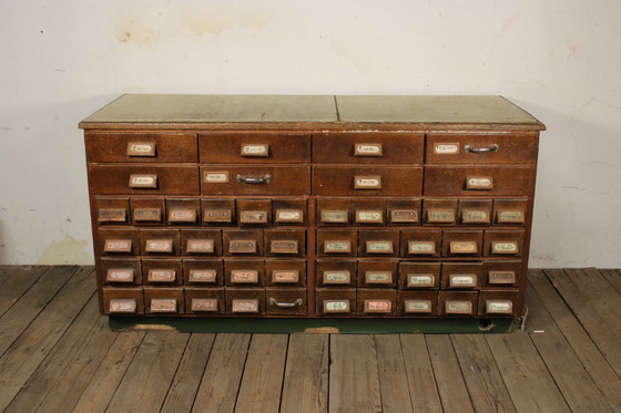 Image 1 of Antique industrial apothecary cabinet • Vintage wood and metal drawer cabinet with many compartments