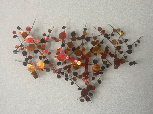 C. Sculpture murale en métal Jeré
