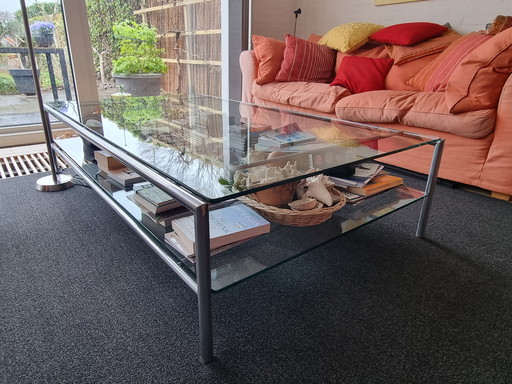 Glass and stainless steel coffee table