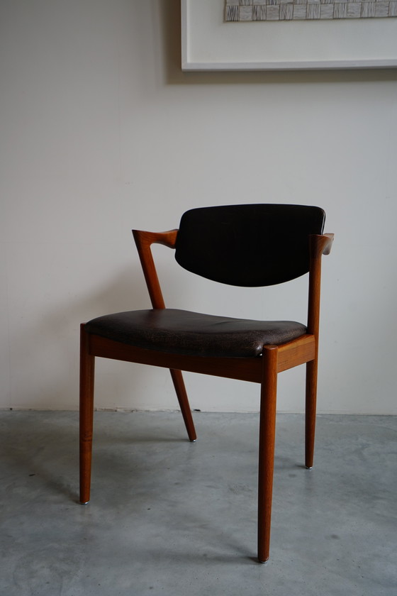 Image 1 of 6 Kai Kristiansen stoelen | Model 42 | Teak Leder patina