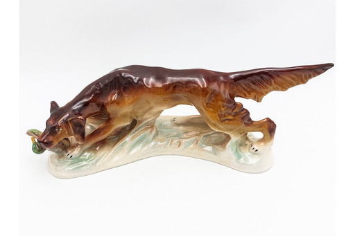 Porcelain figurine of a dog.