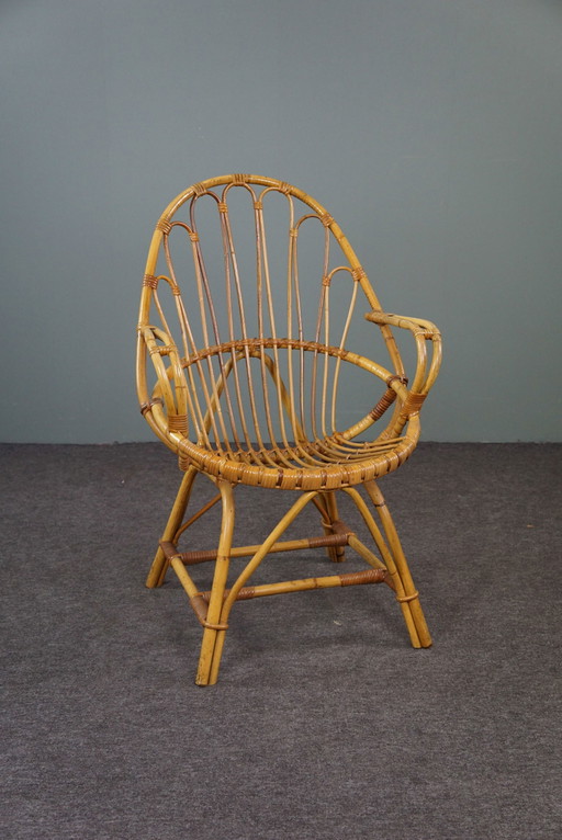Poltrona in rattan con braccioli, design olandese, 1950