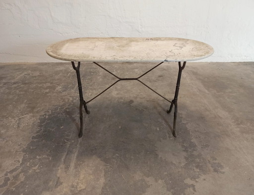 Tavolo da giardino con piano in pietra