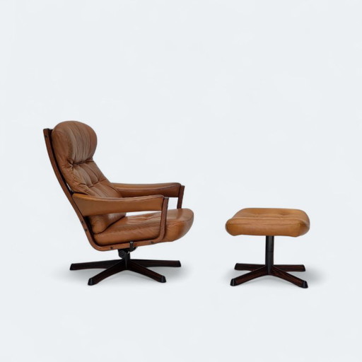 1970s, Swedish design by Gote Möbler, swivel chair with footstool, leather.