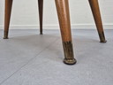 Vintage footstool, wood with brass legs.