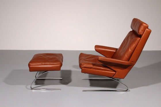 Image 1 of Cognac Leder COR Swing Lounge Stuhl mit Ottomane von Adolf & Schöpfer 1976
