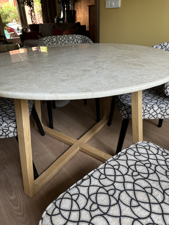 Image 1 of Round travertine dining table
