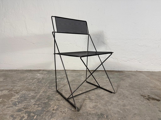 Niels Jørgen Haugesen X Line perforated metal chair 