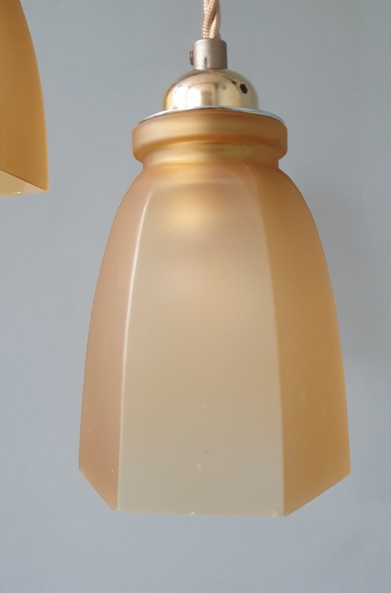 Image 1 of Set Vintage franse gele hanglampen van gekleurd glas.