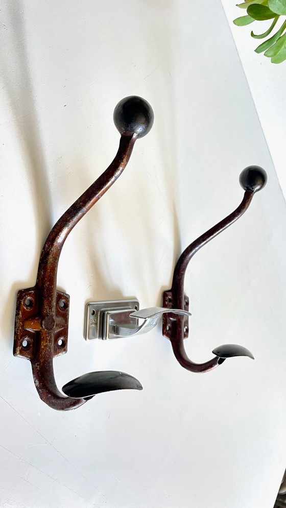 Image 1 of Vintage Patinated Metal Coat Hooks