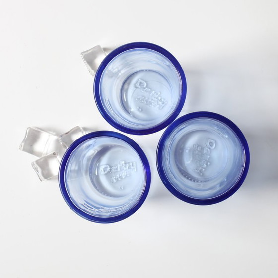 Image 1 of Set van 3 vintage Derby Blue glazen in lichtblauwe kleur / Rastal / Italië / 2001