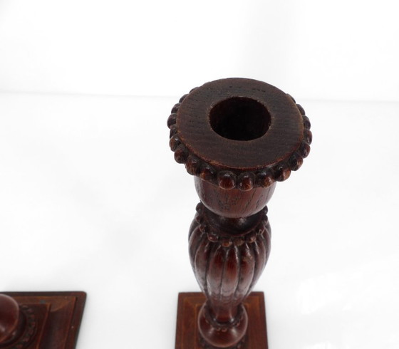 Image 1 of Pair of neoclassical carved and turned wood candlesticks, France, circa 1950