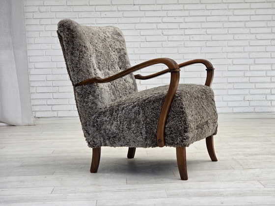 Image 1 of 1960s Reupholstered Danish Armchair in New Zealand Genuine Sheepskin