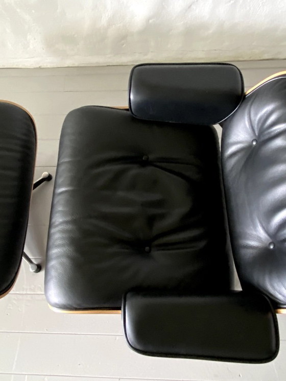 Image 1 of Original Eames Lounge Chair Rosewood XL en cuir noir avec Ottoman.